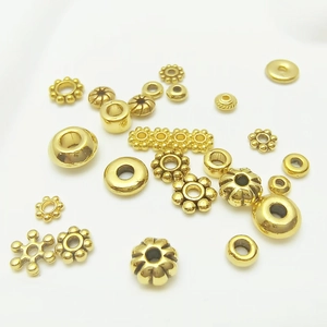 Antique gold alloy spacer beads and snowflake flower charms for DIY jewelry making