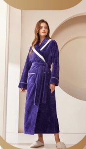 Detailed texture of thick purple flannel bathrobe with white lapel trim and waist belt
