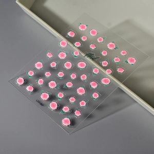 3D pink rose nail art stickers with green leaves and embossed floral texture on clear film