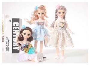 Detailed view of three jointed fashion dolls in elegant lace and floral dresses