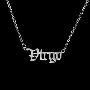 Macro shot of Virgo zodiac letter pendant in gothic font on stainless steel chain