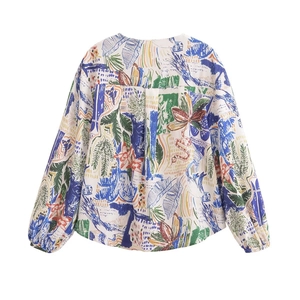 Womens V-neck loose fit blouse featuring colorful tropical graffiti print and long sleeves