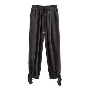 Women's black casual lantern pants with elastic waist and stylish bow-tie leg cuffs