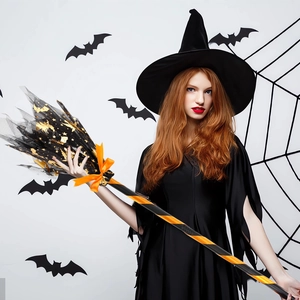 Girl Halloween witch costume with black dress, pointed hat and starry tulle broom