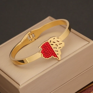 Elegant gold maple leaf necklace with red crystals and hollow design in stainless steel