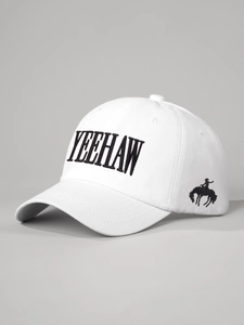 Close-up of white cotton baseball cap with black YEEHAW embroidery and cowboy motif