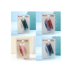Detail view of silicone scalp massager brushes in various colors with retail packaging