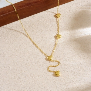 Elegant gold-plated stainless steel Y-necklace featuring four puffed heart charms