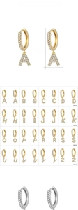 Detailed view of rhinestone letter earrings in gold and silver showing 2.7cm size details