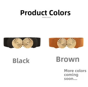 Detail of black and brown elastic waist belts with round gold metal textured buckles