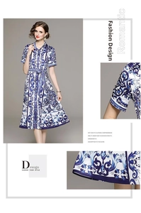 Detailed view of Mediterranean blue floral print dress with waist belt and shirt collar