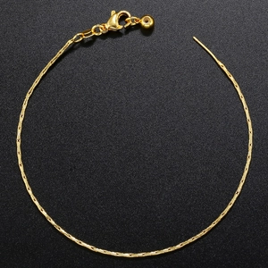 Elegant gold plated brass snake chain bracelet with adjustable lobster clasp on black background