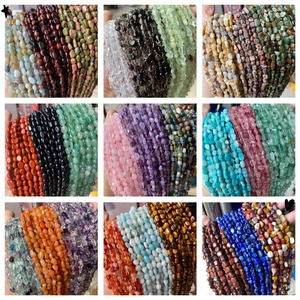 Detailed grid of diverse natural irregular gemstone beads including rose quartz and amethyst