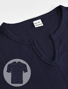 Detailed view of dark blue V-neck T-shirt showing vertical stripe texture and M size label