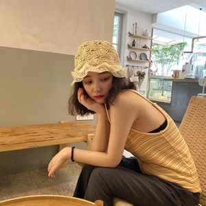 Handmade crochet straw bucket hat with delicate lace brim and ruffle hollow design