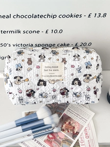 Quilted cartoon dog cosmetic bag with bubble texture and zipper closure for travel