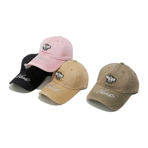 Adjustable cotton baseball cap for women with bee embroidery and side lettering in four colors