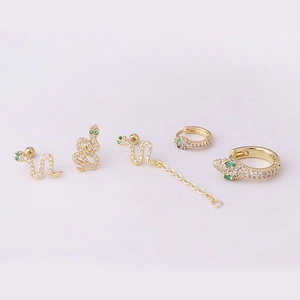 5-piece gold snake earring set with green cubic zirconia eyes and pave crystal details