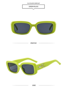 Detail view of neon green rectangular sunglasses with silver star metal ornaments
