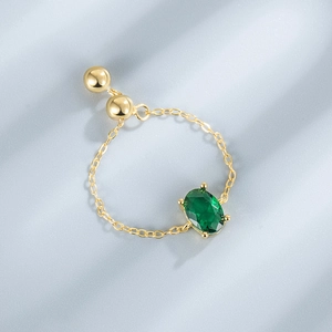 Adjustable S925 silver chain ring with oval green stone and gold-plated finish