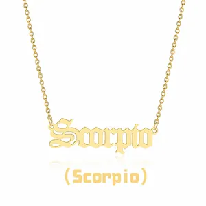 Detailed macro view of gold-plated Scorpio zodiac necklace pendant with a fine O-chain