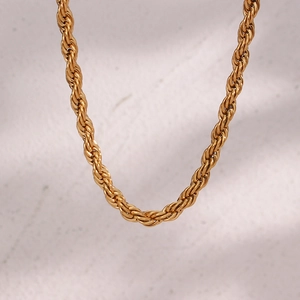 Close-up of 18K gold plated stainless steel twist rope chain with detailed metal texture