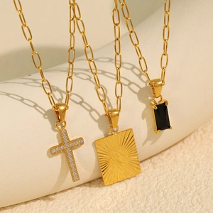 Gold titanium steel necklaces featuring cross, black zircon, and embossed square pendants