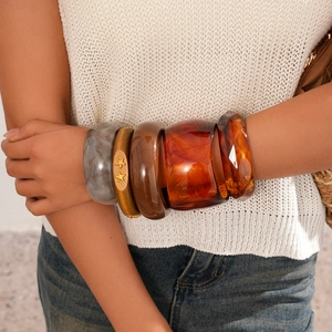 Bohemian retro acrylic and wood bangle set featuring marble patterns and gold star accents