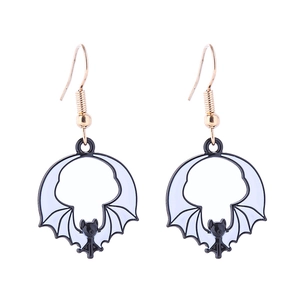 Detail of bat-shaped drop oil earrings in black and light blue with gold hooks