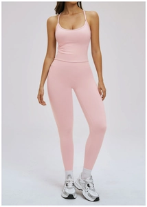 Detailed view of pink high-waist yoga set with slim-fit sports vest and leggings