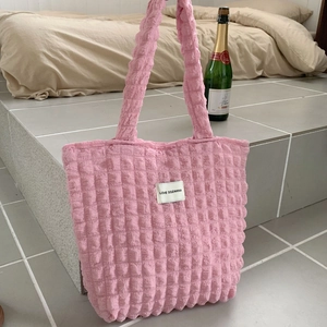 Detailed close-up of pink puff fabric tote bag with LOVE SOZAKKA woven label