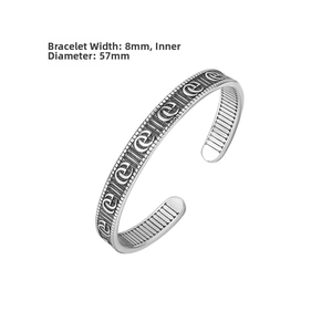 Détail d'un bracelet vintage en plumes d'aigle de 8mm de large et 57mm de diamètre