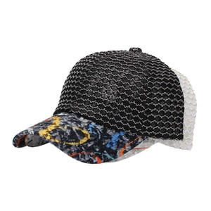 Detail of black baseball cap showing intricate floral embroidery and white breathable mesh