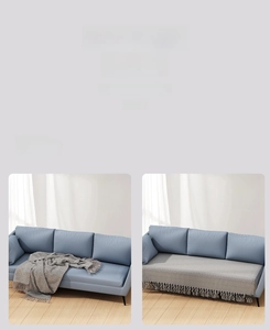 Detailed view of grey sofa cover with anti-slip Velcro strips showing secure fit results