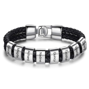 Detail of black braided leather bracelet with engraved silver metal beads showing names