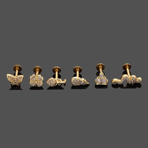 Set of 6 gold stainless steel piercing studs featuring crown, feather, and butterfly shapes