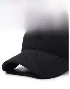 Macro detail of high-quality black wool baseball cap with silicone MADE emblem and curved brim