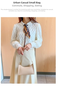 Detail of minimalist beige faux leather shoulder bag with wide strap for daily casual use