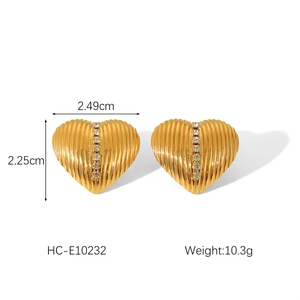 Detailed size view of heart earrings with vertical texture and white zircon stones