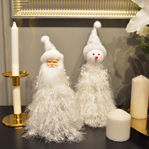 White plush Christmas tree hats with Santa and Snowman figures and golden tinsel accents