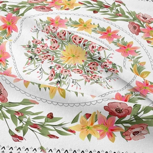 Close-up of bohemian floral tapestry texture showing cotton fabric and pink flower print