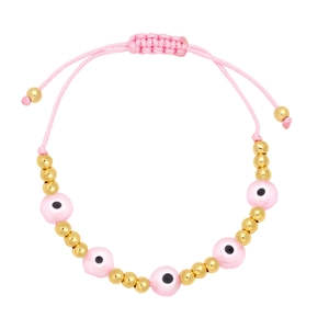 Detail of pink woven evil eye bracelet with golden beads and adjustable sliding knot