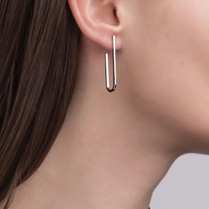 Minimalist 925 sterling silver J-shaped geometric stud earrings worn on ear