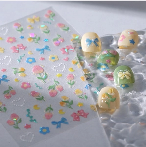 Detailed view of tulip floral nail stickers with laser iridescent effect and 3D texture