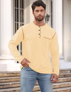Detail of light yellow Henley shirt with buttoned collar and chest pocket texture