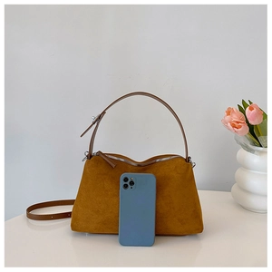 Brown faux suede tote bag shown next to a smartphone for a clear size comparison