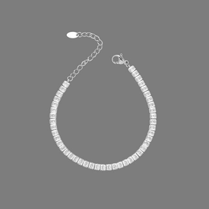 Elegant silver tennis bracelet with rectangle-cut cubic zirconia and lobster clasp closure