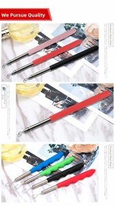 Detail view of colorful ergonomic bracelet helper hook tools on marble surface