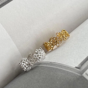 Minimalist S925 sterling silver hollow flower rings in gold and silver finishes