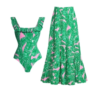 Pink and green tropical leaf print one-piece swimsuit with matching ruffled maxi skirt set